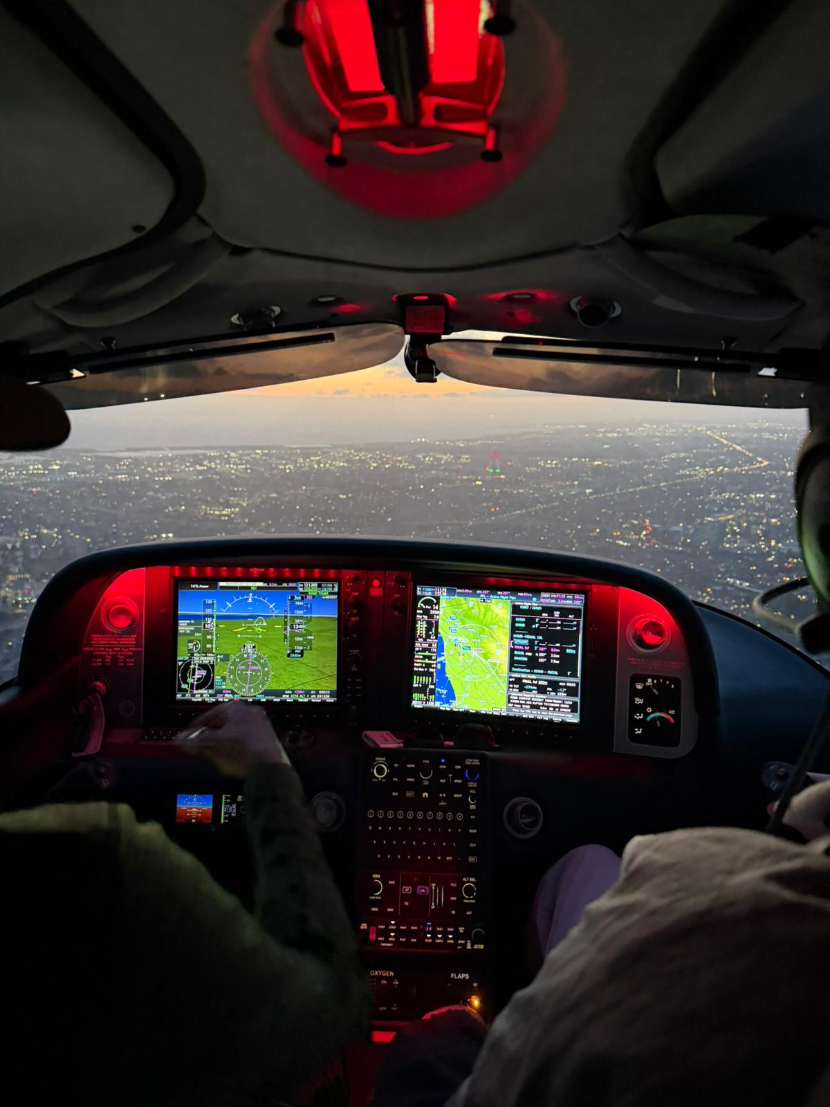 Night flight cockpit view approaching Hayward